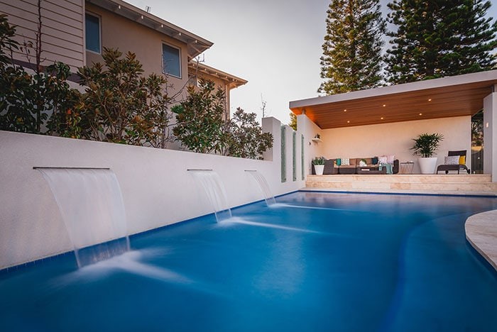 stunning outdoor area with pool by Revell Landscaping